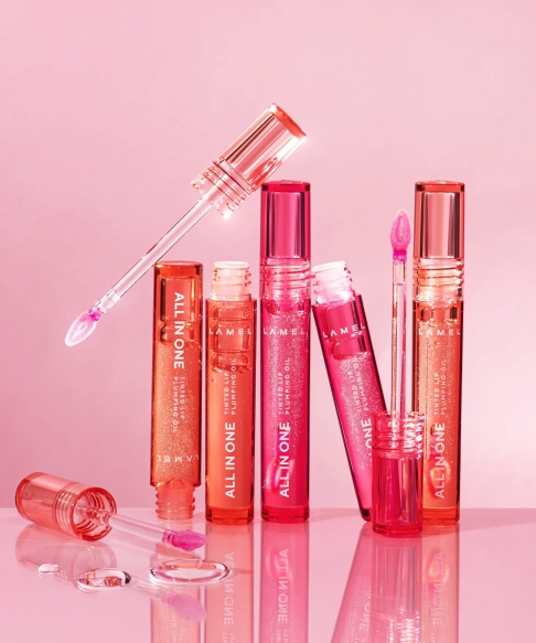 all_in_one_lip_tinted_plumping_oil_402_pink_sparkle_product_shot_1.webp